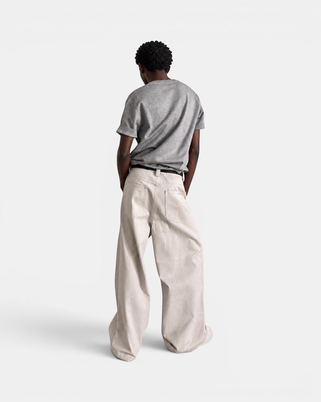 NAMELESS light beige washed denim wide-leg jeans with a five-pocket design on a male model.