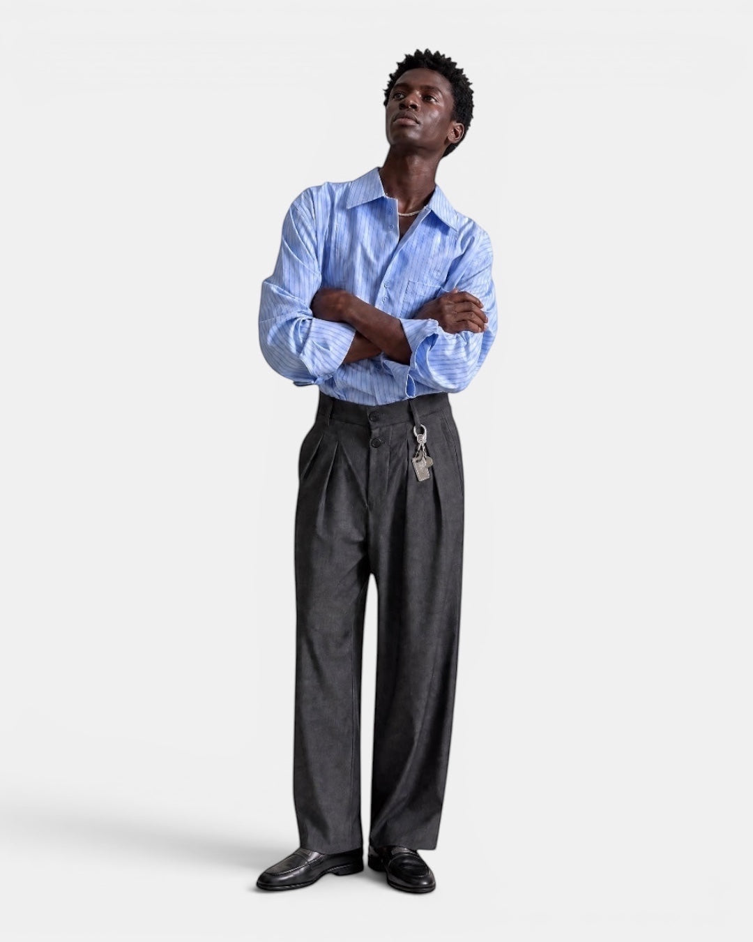 Nameless light blue striped fine-textured loose-fitting long-sleeved shirt worn by a male model.