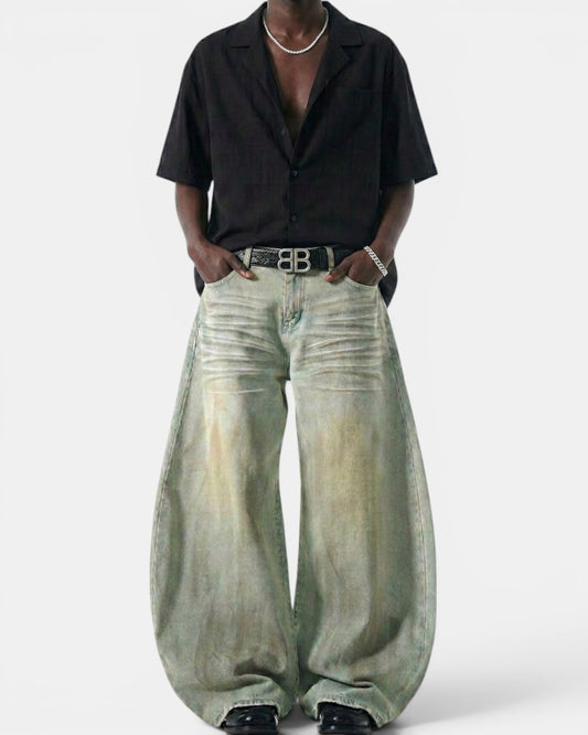 NAMELESS light blue washed rayon-blend denim wide-leg jeans with a curved silhouette and vintage-inspired fading.